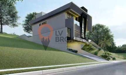 Magnífica casa de alto padrão em condomínio de luxo em Arujá-SP, com 4 suítes - EM CONSTRUÇÃO - ENTREGA MARÇO 26.