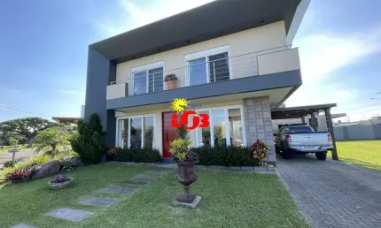 Casa 3 dormitórios suítes, alto padrão em condomínio fechado/Tramandaí
