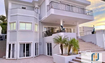 Casa belíssima para venda e locação no residencial alphaville 08