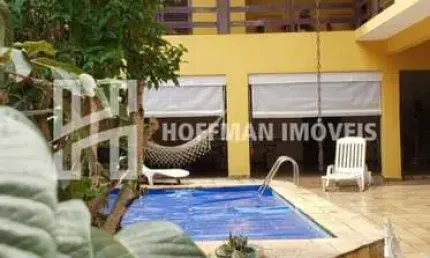 Sobrado à venda 4 dorms (4 suítes), 3 salas, 5 banheiros e 5 vagas