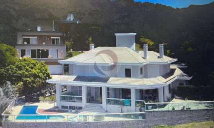 Casa em condomínio fechado com 5 quartos para alugar na Rodovia Haroldo Soares Glavan, 1670, Cacupé, Florianópolis por R$ 23.000