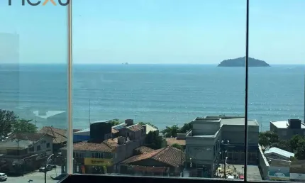 Apartamento com excelente localização com vista para o mar