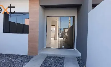 Casa geminada moderna em navegantes: conforto e segurança com localização privilegiada!