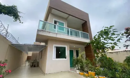 Casa em condomínio fechado com 4 quartos à venda no Abrantes, Camaçari  por R$ 690.000
