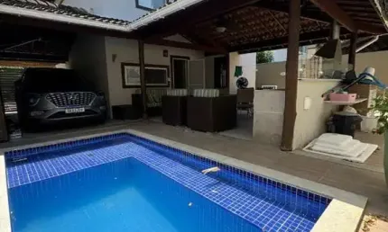 Casa em condomínio fechado com 4 quartos à venda no Abrantes, Camaçari  por R$ 870.000