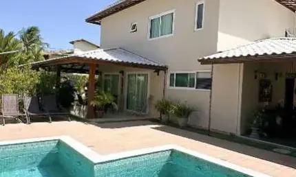 Casa em condomínio fechado com 4 quartos à venda no Buraquinho, Lauro de Freitas  por R$ 2.100.000