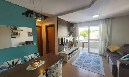 Apartamento no parque industrial com churrasqueira na sacada.