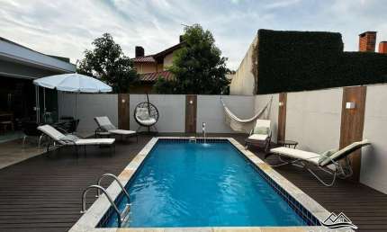 Casa com 4 quartos à venda na Avenida dos Dourados, 445, Jurerê Internacional, Florianópolis por R$ 5.270.000