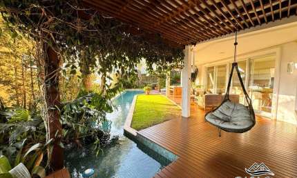Casa em condomínio fechado com 4 quartos à venda na Rodovia Haroldo Soares Glavan, 3820, Cacupé, Florianópolis por R$ 6.560.000