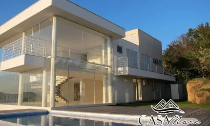 Casa em condomínio fechado com 3 quartos à venda na Rodovia Haroldo Soares Glavan, 4000, Cacupé, Florianópolis por R$ 5.500.000