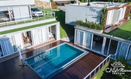 Casa em condomínio fechado com 5 quartos à venda na Rodovia Rafael da Rocha Pires, 3441, Sambaqui, Florianópolis por R$ 5.490.000