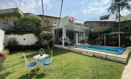 Casa com 5 quartos à venda na Rua Estácio de Sá, 332, Chácara das Pedras, Porto Alegre