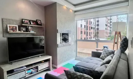 Apartamento com dois quartos, churrasqueira e vaga, no Sarandi