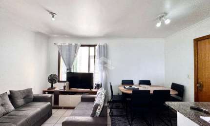 Apartamento um quarto, com lareira, churrasqueira e uma vaga