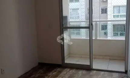Apartamento com dois quartos, suíte, sacada com churrasqueira e vaga