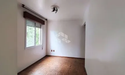 Apartamento 2 dormitórios com 1 vaga de garagem, cozinha com área serviço separada no Bairro São Sebastião