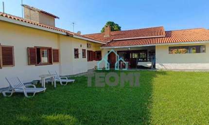 Casa com 4 dormitórios à venda, 380 m² por R$ 2.500.000,00 - Condomínio Vale do Sol - Tremembé/SP