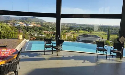 Casa de luxo em condomínio: 3 quartos, 3 suítes, 4 salas, 6 banheiros, 12 vagas de garagem e 564m² em atibaia-sp.