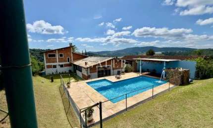 Chácara à venda em condomínio, com 4 quartos, 1.665m² de terreno