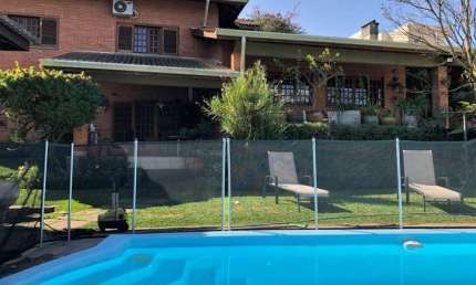 Casa em condomínio fechado com 9 quartos à venda na Rua Argentina, 201, Recanto Impla, Carapicuíba por R$ 1.800.000