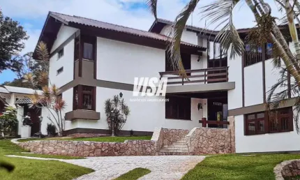 Casa em condomínio fechado com 4 quartos à venda na Rodovia Haroldo Soares Glavan, 1900, Cacupé, Florianópolis por R$ 2.900.000