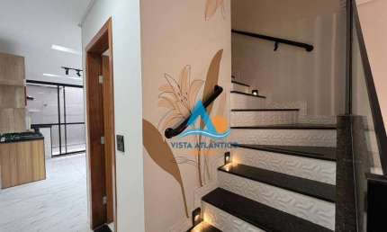 Casa com 2 dormitórios à venda, 90 m² por R$ 600.000,00 - Caiçara - Praia Grande/SP