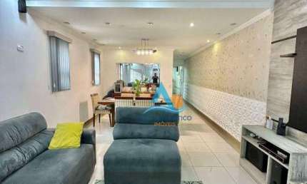 Sobrado com 3 dormitórios à venda, 137 m² por R$ 1.040.000,00 - Boqueirão - Praia Grande/SP