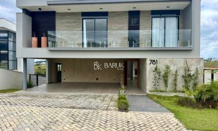 Casa 4 suítes com 420 m2 de área construída no condomínio Alphaville