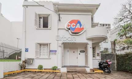 Casa em condomínio fechado com 3 quartos à venda na Rua Xavier Ferreira, 90, Auxiliadora, Porto Alegre por R$ 1.150.000
