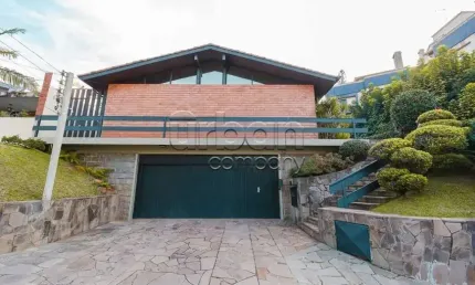 Casa em condomínio fechado com 4 quartos à venda na Travessa Java, 76, Jardim Lindóia, Porto Alegre por R$ 1.090.000