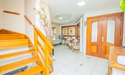 Casa em condomínio fechado com 3 quartos à venda na Rua Professor Isidoro La Porta, 58, Jardim Planalto, Porto Alegre por R$ 1.299.000