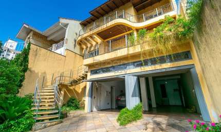 Casa em condomínio fechado com 5 quartos à venda na Rua Isidoro Tressi, 507, Jardim Botânico, Porto Alegre por R$ 1.550.000