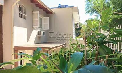 Casa em condomínio fechado com 3 quartos à venda na Rua Artur Rocha, 605, Auxiliadora, Porto Alegre por R$ 750.000