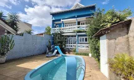 Casa em condomínio fechado com 3 quartos à venda na Rua Itapema, 156, Vila Jardim, Porto Alegre por R$ 1.005.000