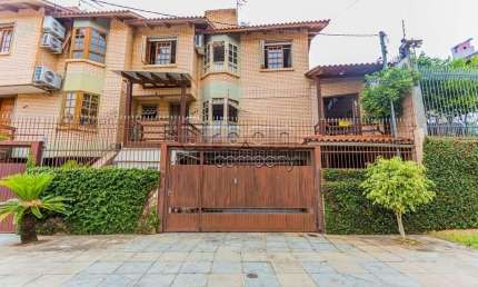 Casa em condomínio fechado com 2 quartos à venda na Rua Heitor Manganelli, 393, Jardim Planalto, Porto Alegre por R$ 660.000