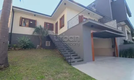 Casa em condomínio fechado com 3 quartos à venda na Rua Francisco Solano Borges, 32, Hípica, Porto Alegre por R$ 990.000