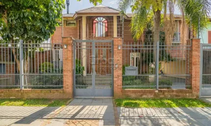 Casa em condomínio fechado com 3 quartos à venda na Rua Maestro Salvador Campanella, 395, Jardim Planalto, Porto Alegre por R$ 1.632.000