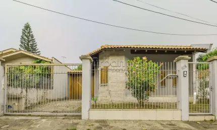Casa em condomínio fechado com 3 quartos à venda na Rua Doutor Jorge Fayet, 651, Chácara das Pedras, Porto Alegre por R$ 1.380.000