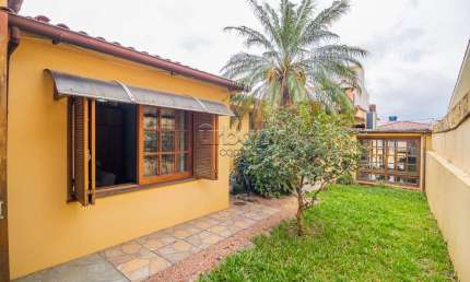 Casa em condomínio fechado com 3 quartos à venda na Rua Artigas, 320, Petrópolis, Porto Alegre por R$ 1.150.000