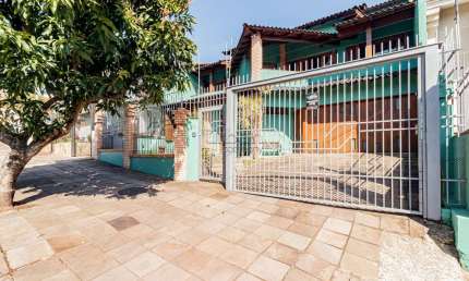 Casa em condomínio fechado com 4 quartos à venda na Rua Dona Adda Mascarenhas de Moraes, 1481, Jardim Planalto, Porto Alegre por R$ 1.800.000