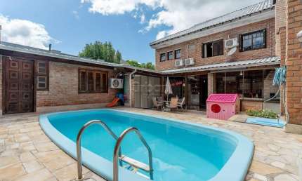 Casa com 3 quartos à venda na Rua Ramis Galvão, 223, Passo da Areia, Porto Alegre por R$ 1.250.000