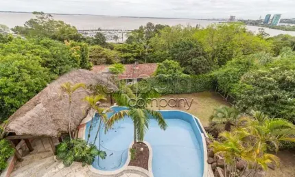 Casa com 5 quartos à venda na Rua Bororó, 301, Vila Assunção, Porto Alegre por R$ 4.000.000
