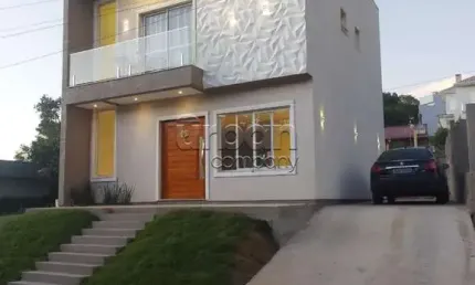 Casa em condomínio fechado com 3 quartos à venda na Avenida Luigi Lucchese, 40, Loteamento Jardim Timbaúva, Gravataí por R$ 899.000