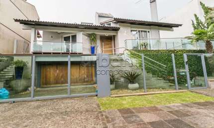 Casa em condomínio fechado com 4 quartos à venda na Rua Professor Ulisses Cabral, 483, Chácara das Pedras, Porto Alegre por R$ 4.770.000