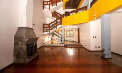 Casa com 5 quartos à venda na Rua Paul Harris, 107, Jardim Itu Sabará, Porto Alegre por R$ 1.200.000