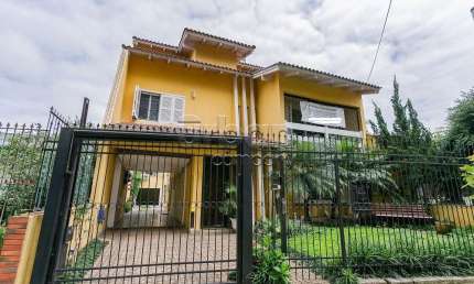Casa com 5 quartos à venda na Travessa Gardênia, 110, São Sebastião, Porto Alegre por R$ 1.180.000