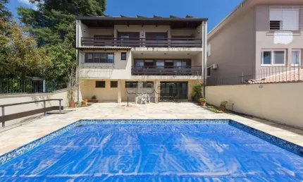 Casa com 5 quartos à venda na Rua Gustavo Schmidt, 125, Três Figueiras, Porto Alegre por R$ 3.799.000