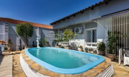 Casa em condomínio fechado com 3 quartos à venda na Rua Professor Leopoldo Tietbohl, 10, Jardim Itu Sabará, Porto Alegre por R$ 680.000