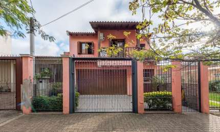Casa em condomínio fechado com 3 quartos à venda na Rua Fernando Cortez, 413, Cristo Redentor, Porto Alegre por R$ 1.050.000