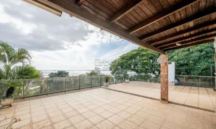 Casa em condomínio fechado com 4 quartos à venda na Avenida Pinheiro Borda, 148, Cristal, Porto Alegre por R$ 1.150.000